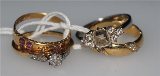 Three 18ct gold and gem set rings and an 18ct shank.